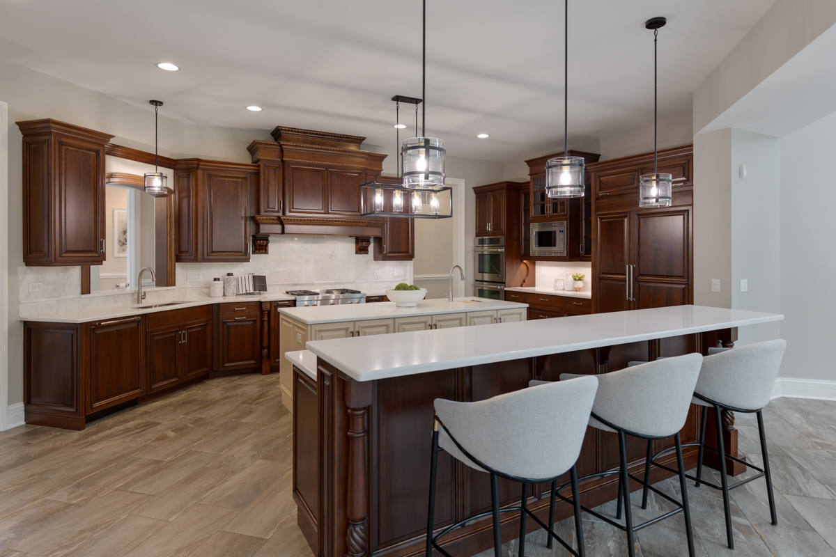 2-s291 Nelson Lake Road Batavia, IL 60510 - Photo 12 of 57 a kitchen with kitchen island granite countertop a sink a center island and stainless steel appliances