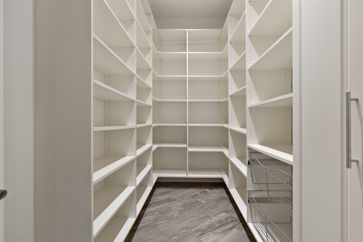 2-s291 Nelson Lake Road Batavia, IL 60510 - Photo 16 of 57 a view of walk in closet with empty racks