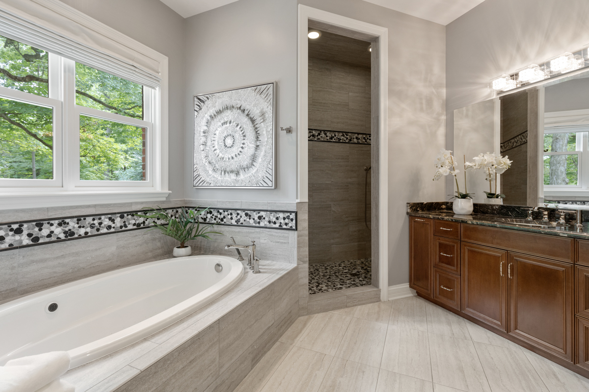 2-s291 Nelson Lake Road Batavia, IL 60510 - Photo 22 of 57 a spacious bathroom with a tub sink and mirror