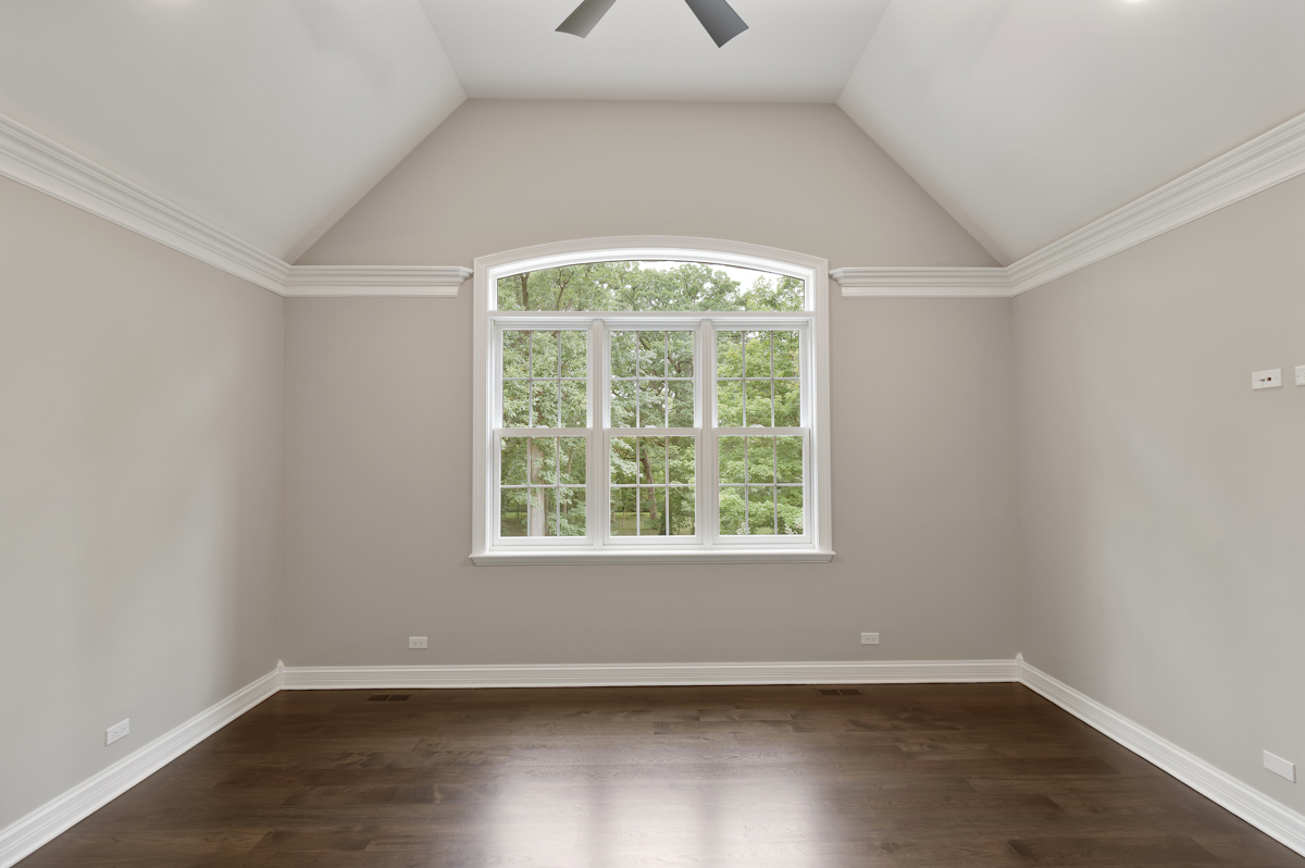 2-s291 Nelson Lake Road Batavia, IL 60510 - Photo 30 of 57 an empty room with wooden floor and windows
