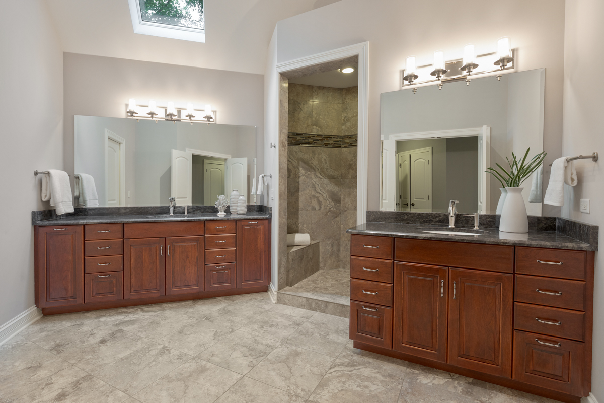 2-s291 Nelson Lake Road Batavia, IL 60510 - Photo 35 of 57 a spacious bathroom with a granite countertop sink and a mirror