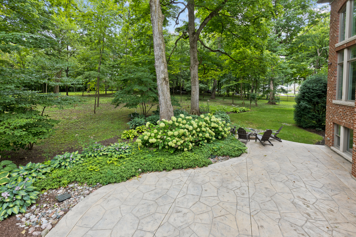 2-s291 Nelson Lake Road Batavia, IL 60510 - Photo 46 of 57 a view of a garden with a lake