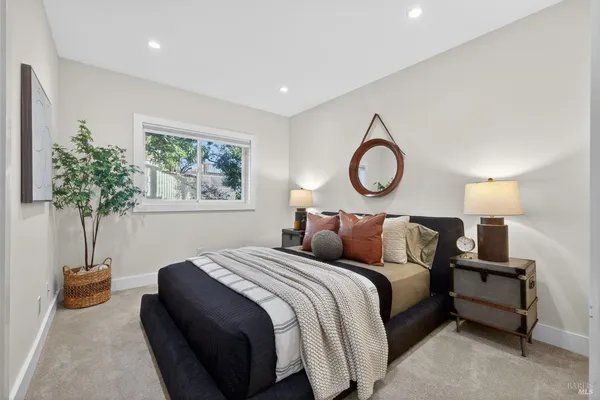 a view of a chair and table on the balcony