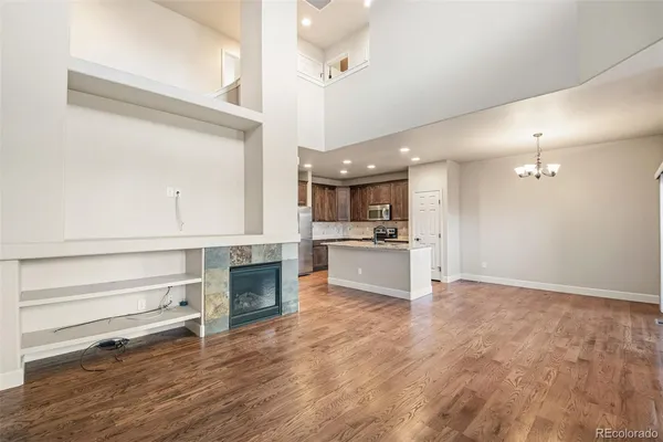 a view of kitchen and kitchen with sink