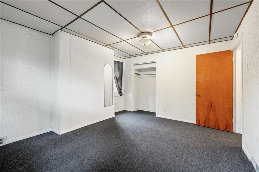 823 Lilac Street, Unit 1 Greenfield, PA 15217 - Photo 18 of 20 a view of a room with wooden walls