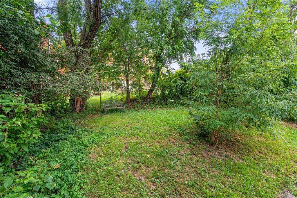 823 Lilac Street, Unit 1 Greenfield, PA 15217 - Photo 4 of 20 a view of backyard with green space