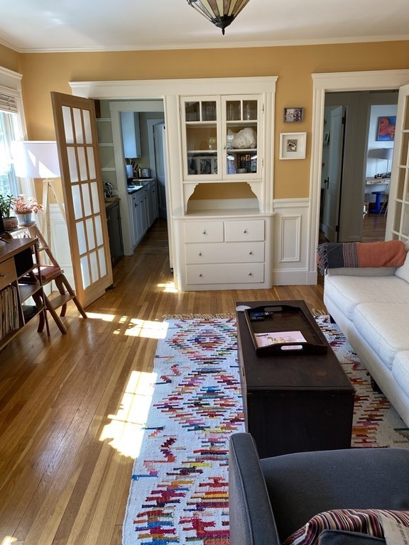 44 Webster Street, Unit 1 Arlington, MA 02474 - Photo 8 of 15 a living room with furniture and a rug