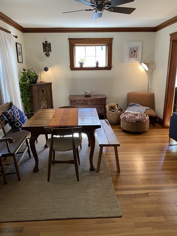 44 Webster Street, Unit 1 Arlington, MA 02474 - Photo 10 of 15 a view of a dining room with furniture and wooden floor