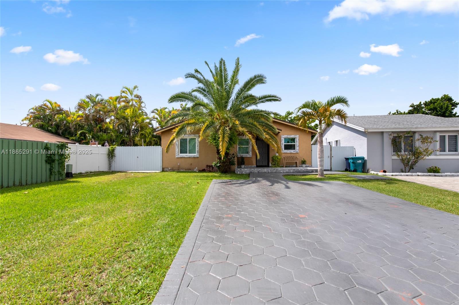 a house view with a garden space