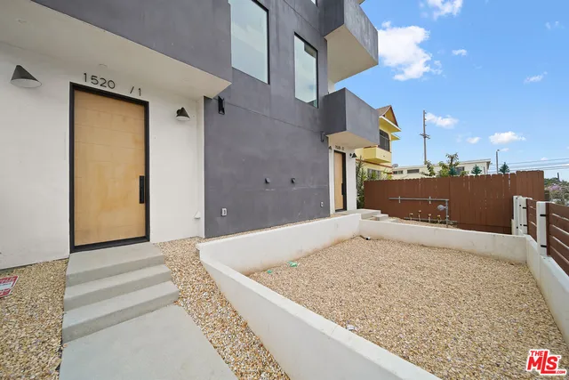a view of a bedroom from the hallway