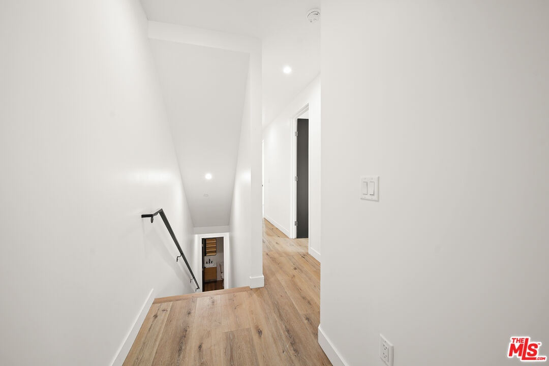 1520 Magnolia Avenue, Unit 1 Los Angeles, CA 90006 - Photo 7 of 21 a view of a hallway with wooden floor