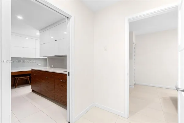 a bathroom with a sink and a washing machine
