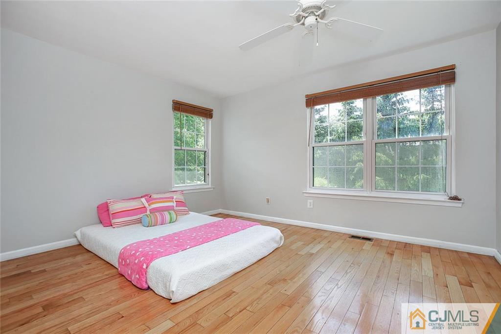 1901 Timber Oaks Road Edison, NJ 08820 - Photo 20 of 23 a bedroom with a bed and a window