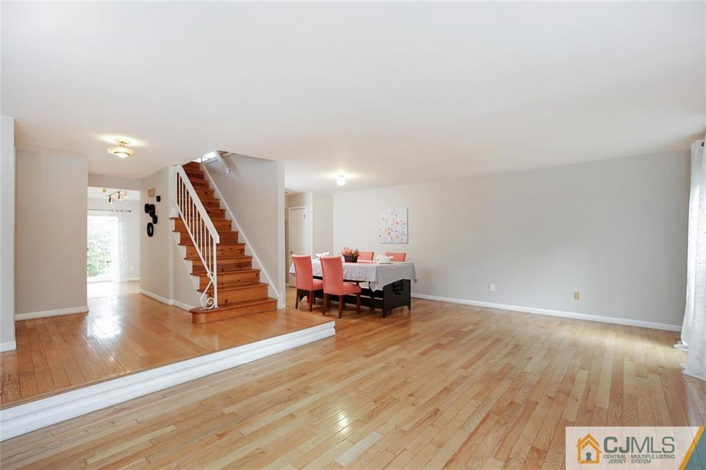 1901 Timber Oaks Road Edison, NJ 08820 - Photo 5 of 23 a living room with furniture and a wooden floor
