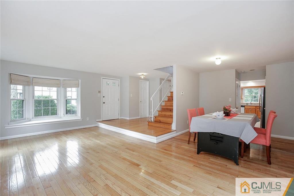 1901 Timber Oaks Road Edison, NJ 08820 - Photo 6 of 23 a living room with furniture and a wooden floor