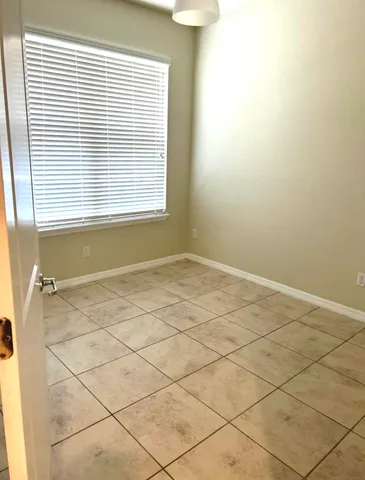 a view of a room and a window