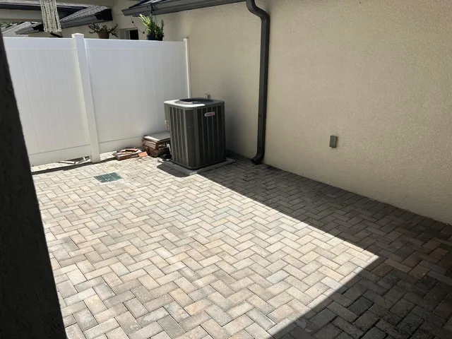 a view of a room with a wooden floor
