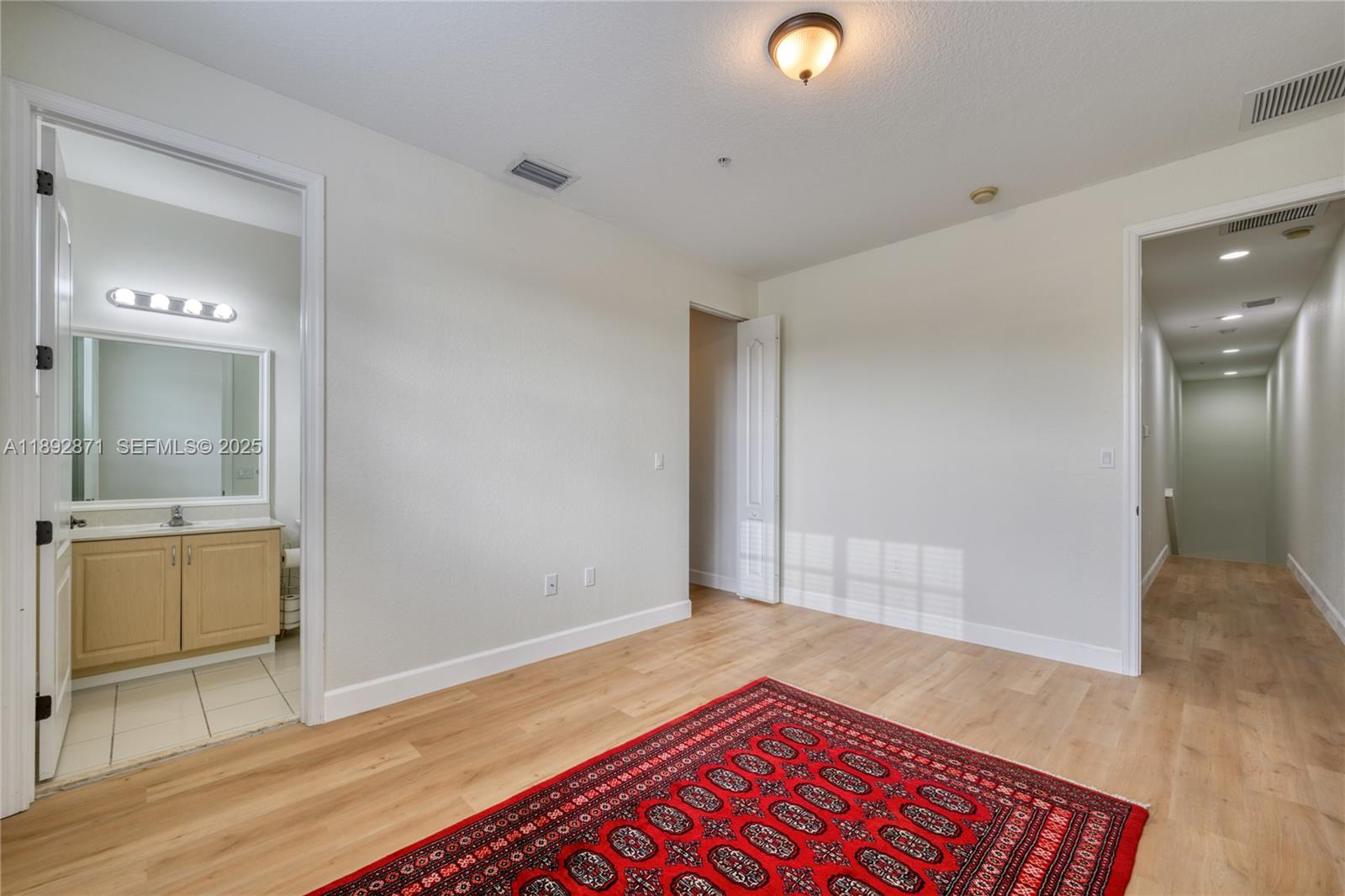 430 Southwest 147th Avenue Pembroke Pines, FL 33027 - Photo 23 of 36 a view of an empty room and window