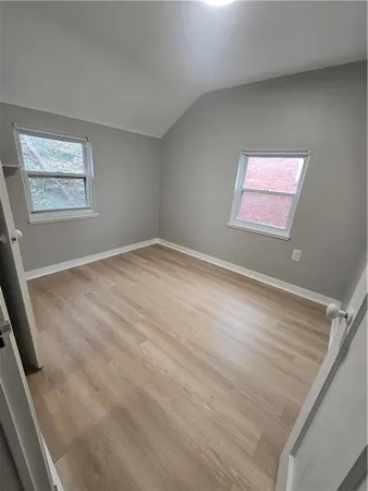 an empty room with windows