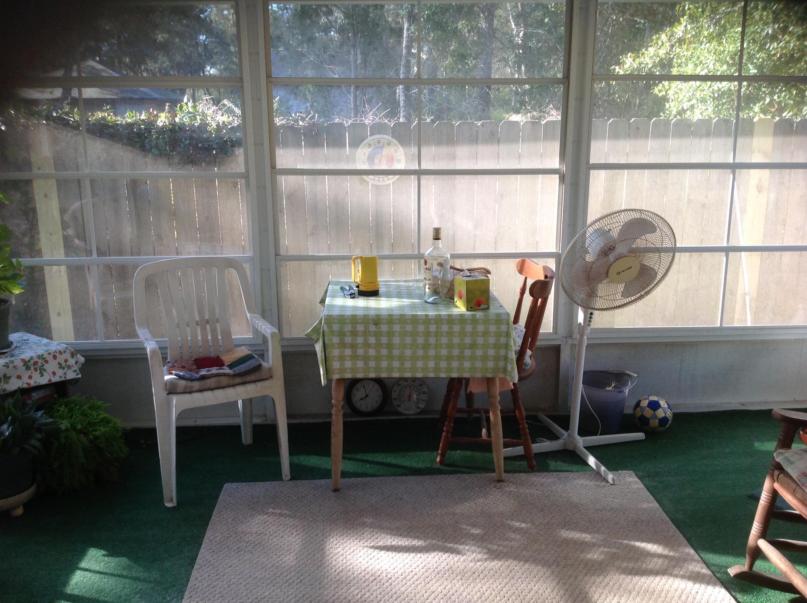 243 Bayou Landing Road Santa Rosa Beach, FL 32459 - Photo 18 of 28 a backyard of a house with barbeque oven table and chairs