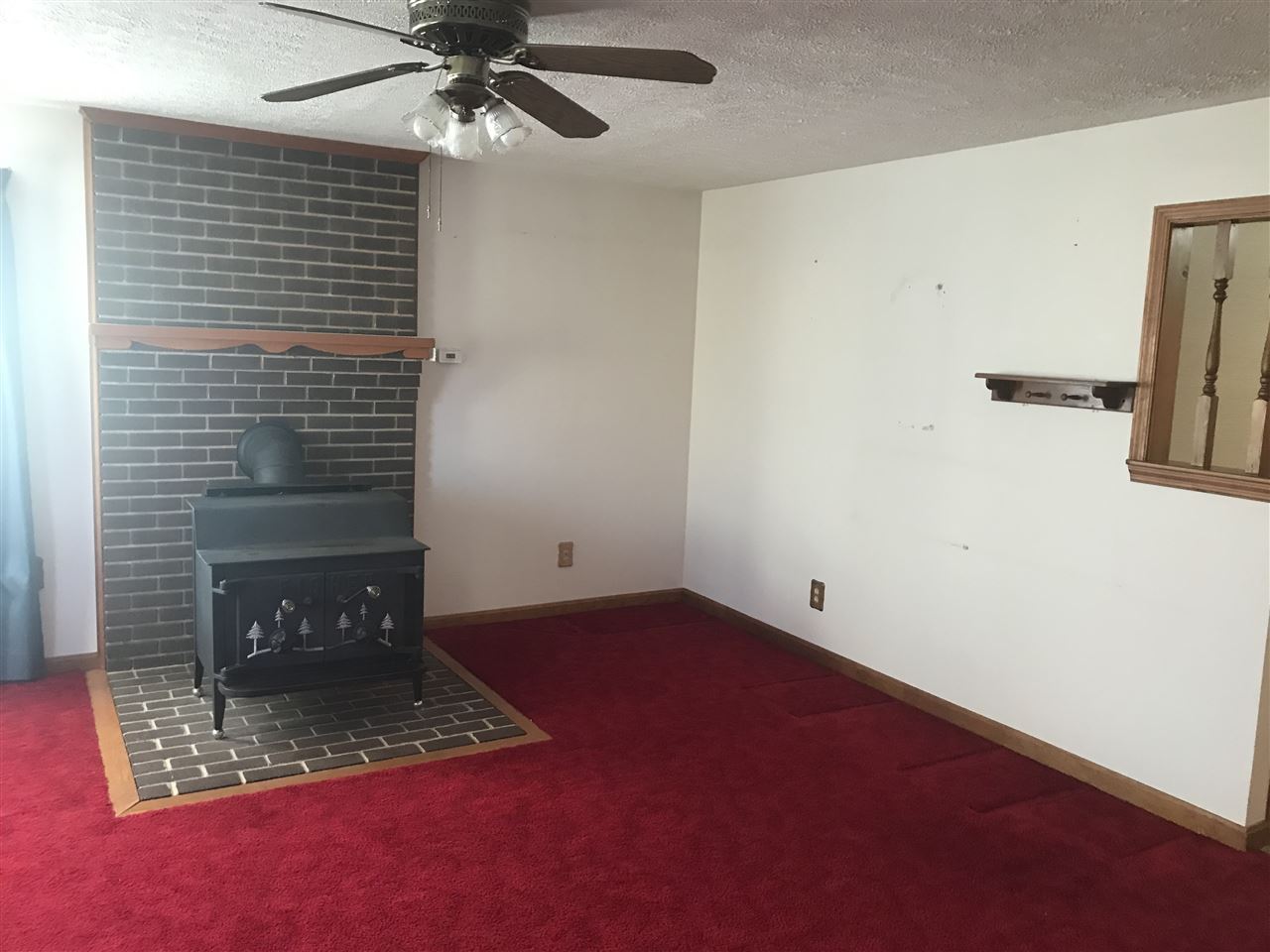 1351 Mt Torrey Road Lyndhurst, VA 22952 - Photo 10 of 28 a view of an empty room with a fireplace