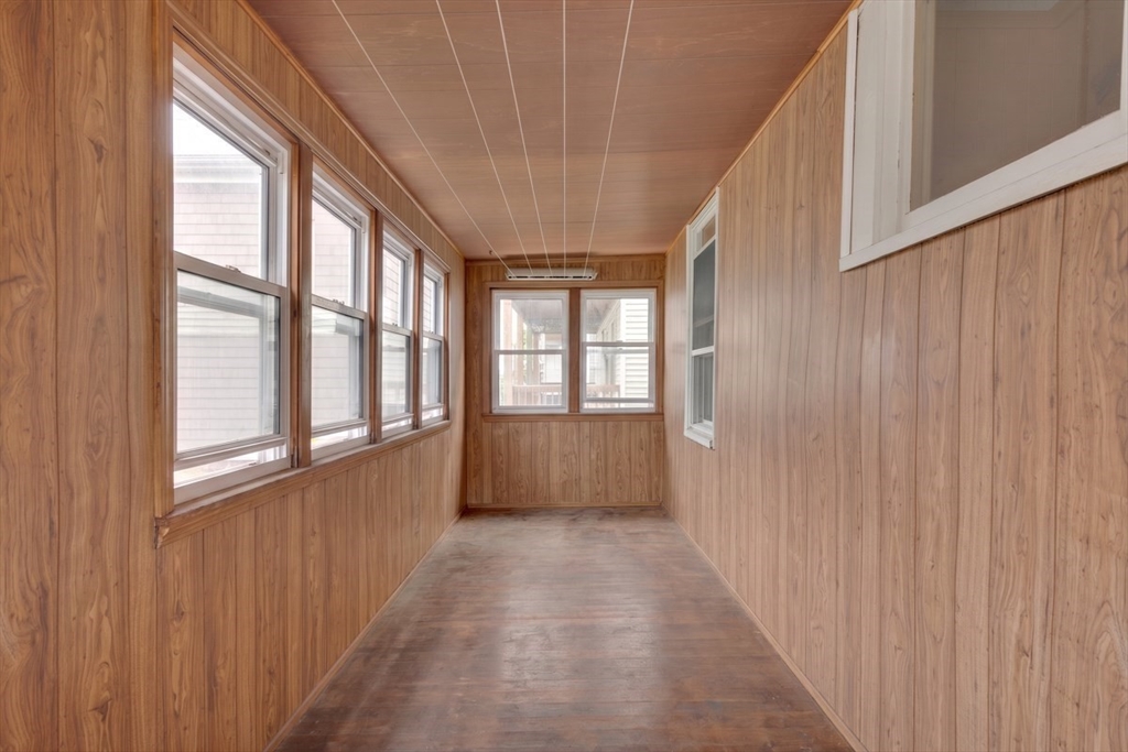 45 Jackson Road Somerville, MA 02145 - Photo 23 of 27 a view of a hallway with a window