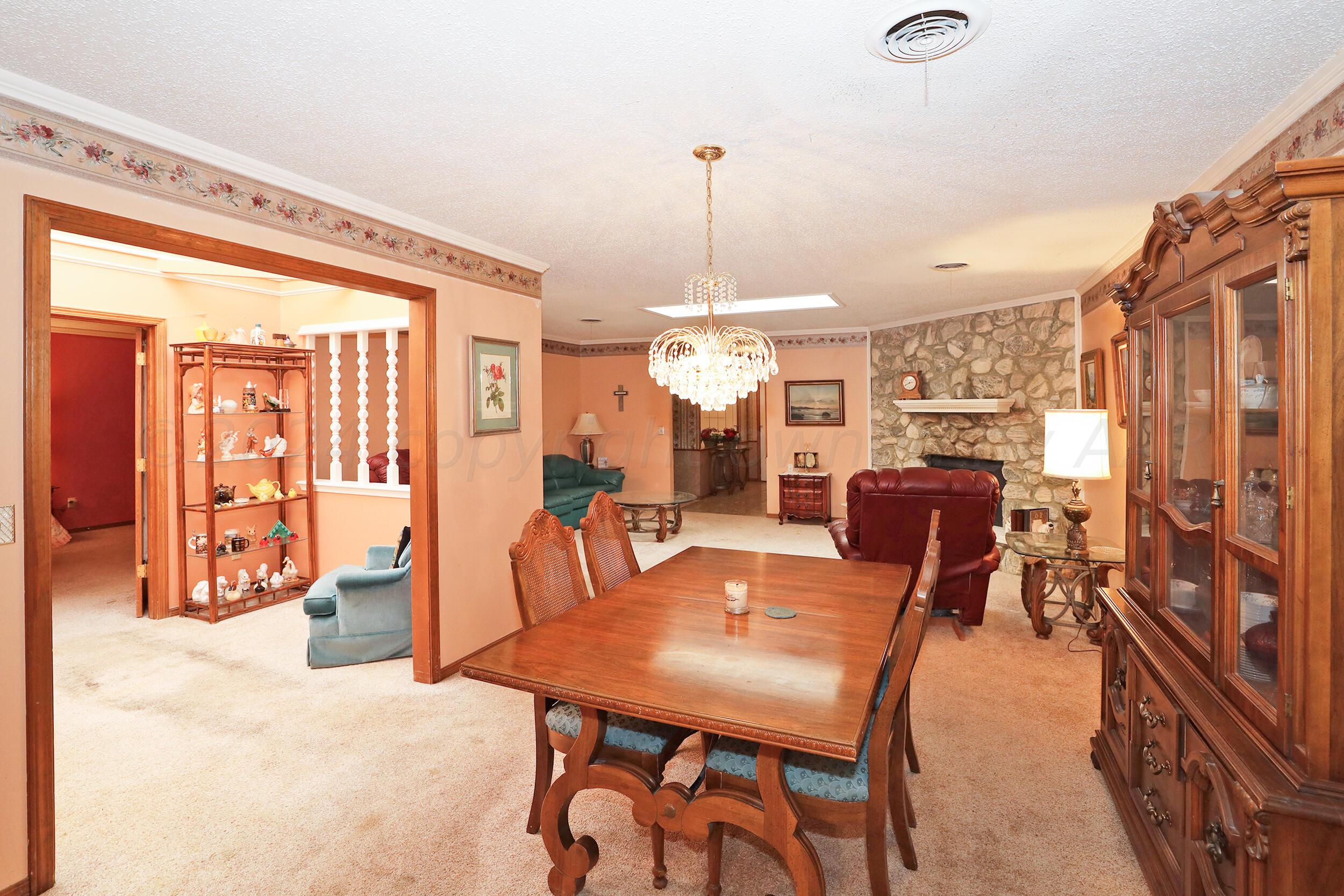 6126 Belpree Road Amarillo, TX 79106 - Photo 8 of 30 Formal Dining & Living Area
