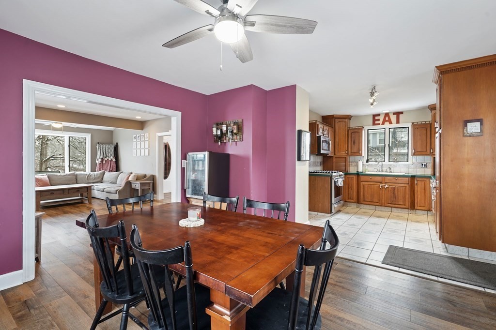 53 Pond Street Canton, MA 02021 - Photo 13 of 31 a view of a dining room with furniture and wooden floor