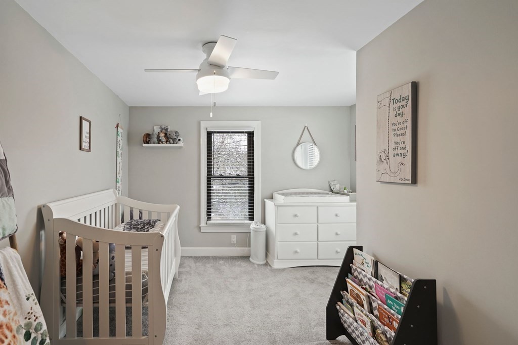 53 Pond Street Canton, MA 02021 - Photo 19 of 31 a bedroom with a bed and a dresser in it