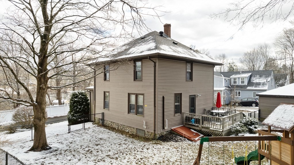 53 Pond Street Canton, MA 02021 - Photo 29 of 31 a brick house with large trees and wooden fence
