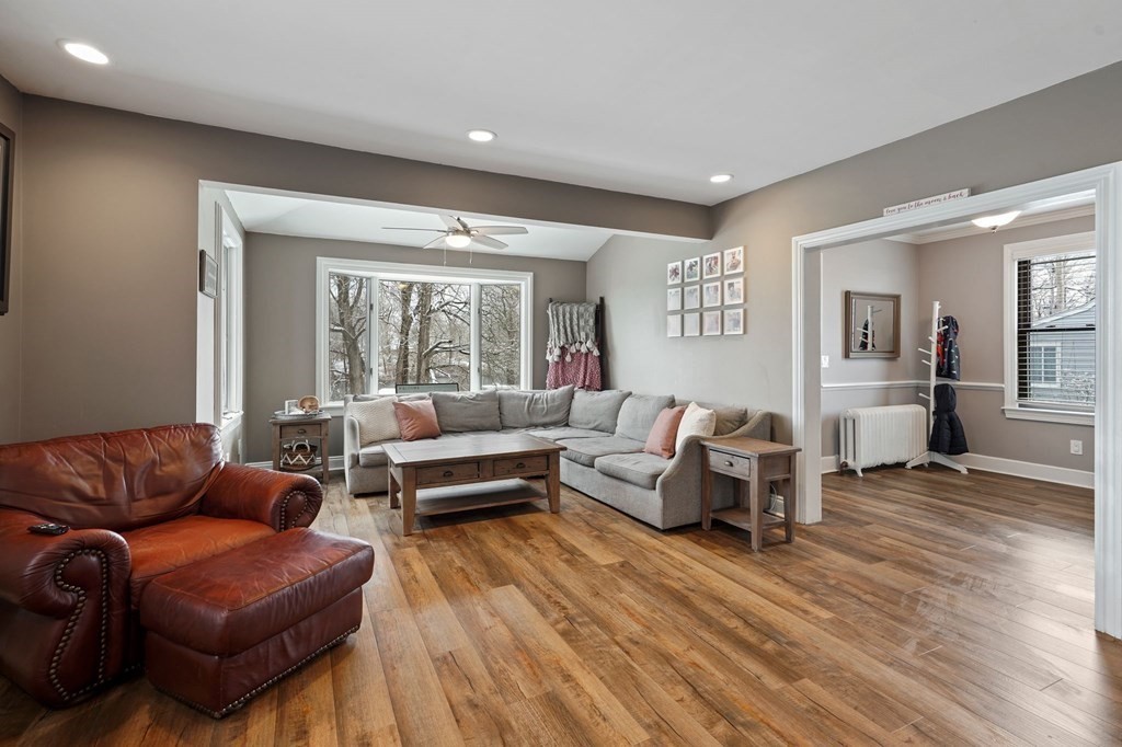 53 Pond Street Canton, MA 02021 - Photo 6 of 31 a living room with furniture and a large window