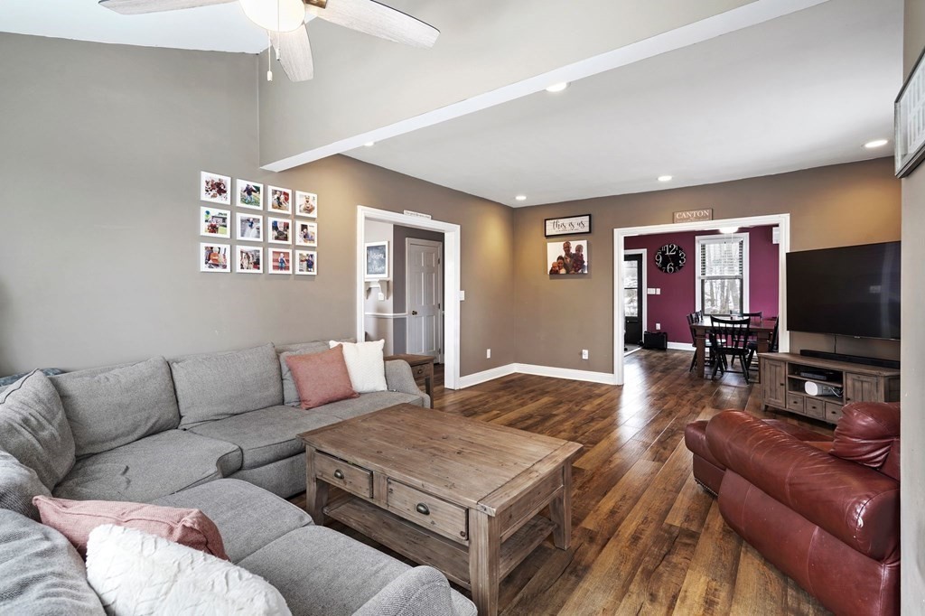 53 Pond Street Canton, MA 02021 - Photo 8 of 31 a living room with furniture and a flat screen tv