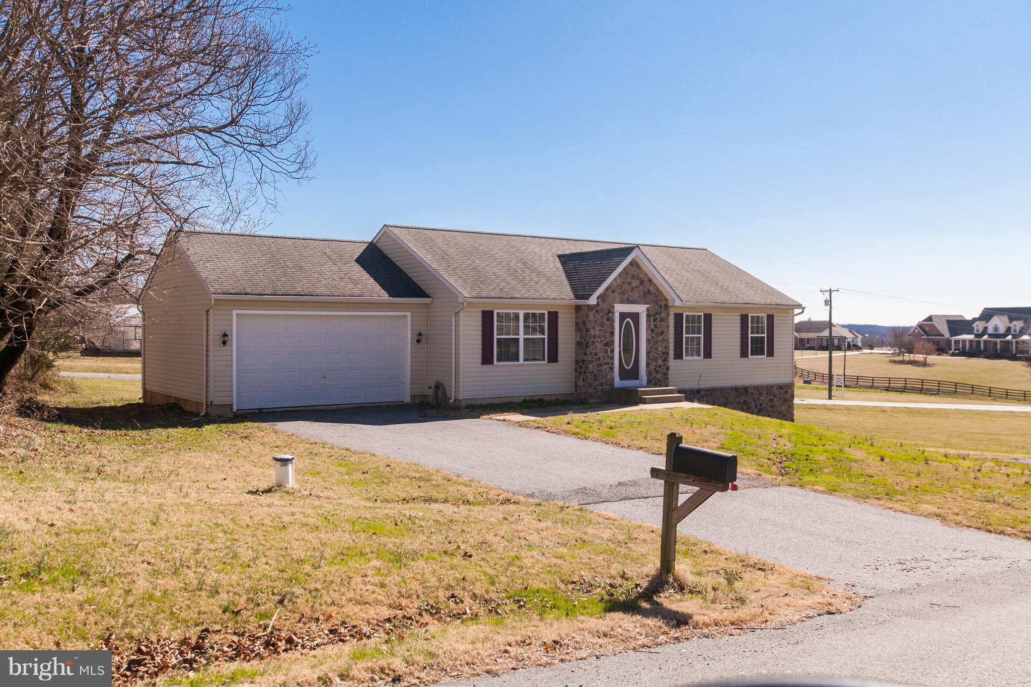 14613 Toll Road New Windsor, MD 21776 - Photo 2 of 30 a front view of house with yard and swimming pool