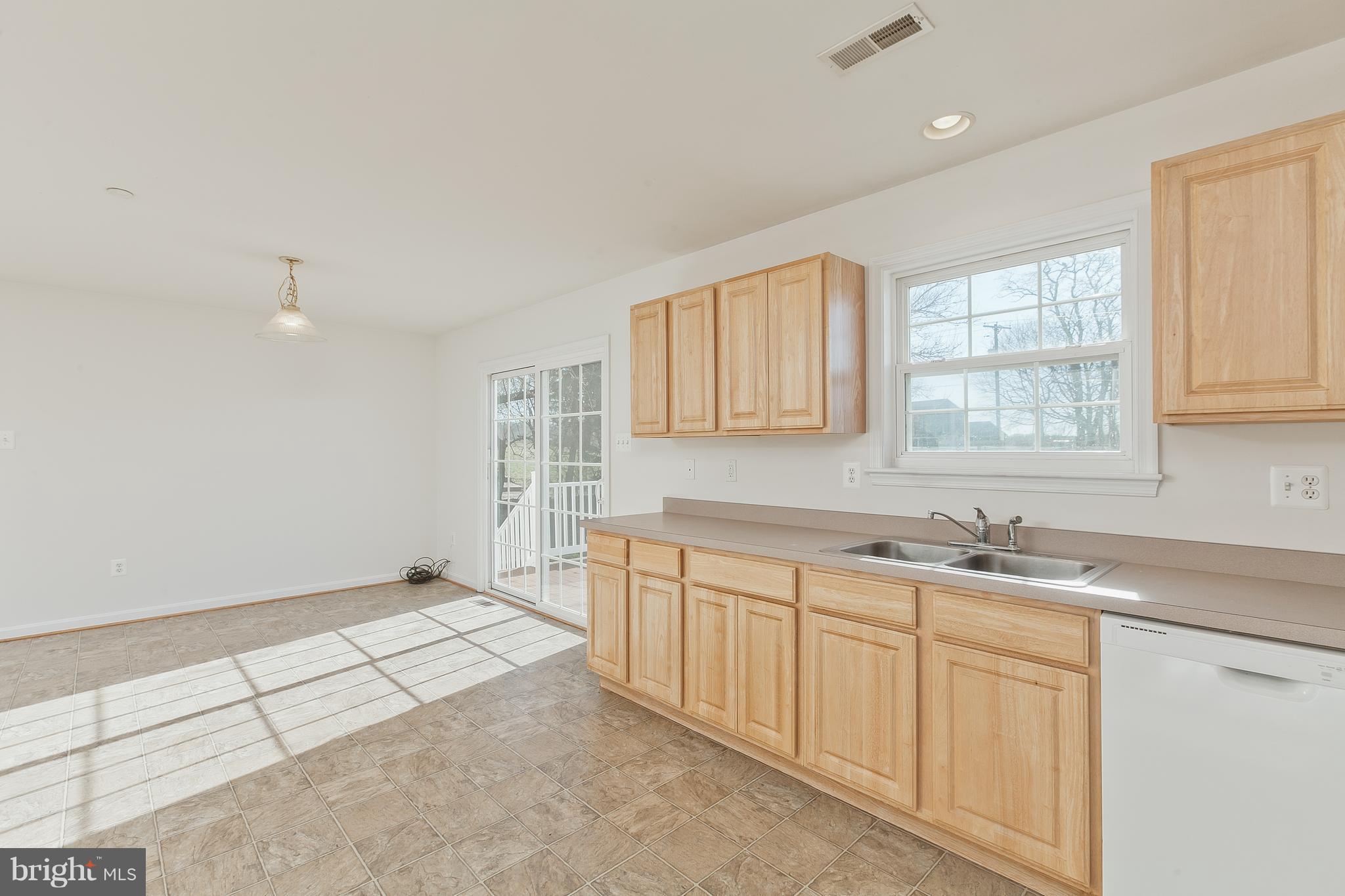 14613 Toll Road New Windsor, MD 21776 - Photo 11 of 30 a kitchen with sink and cabinets