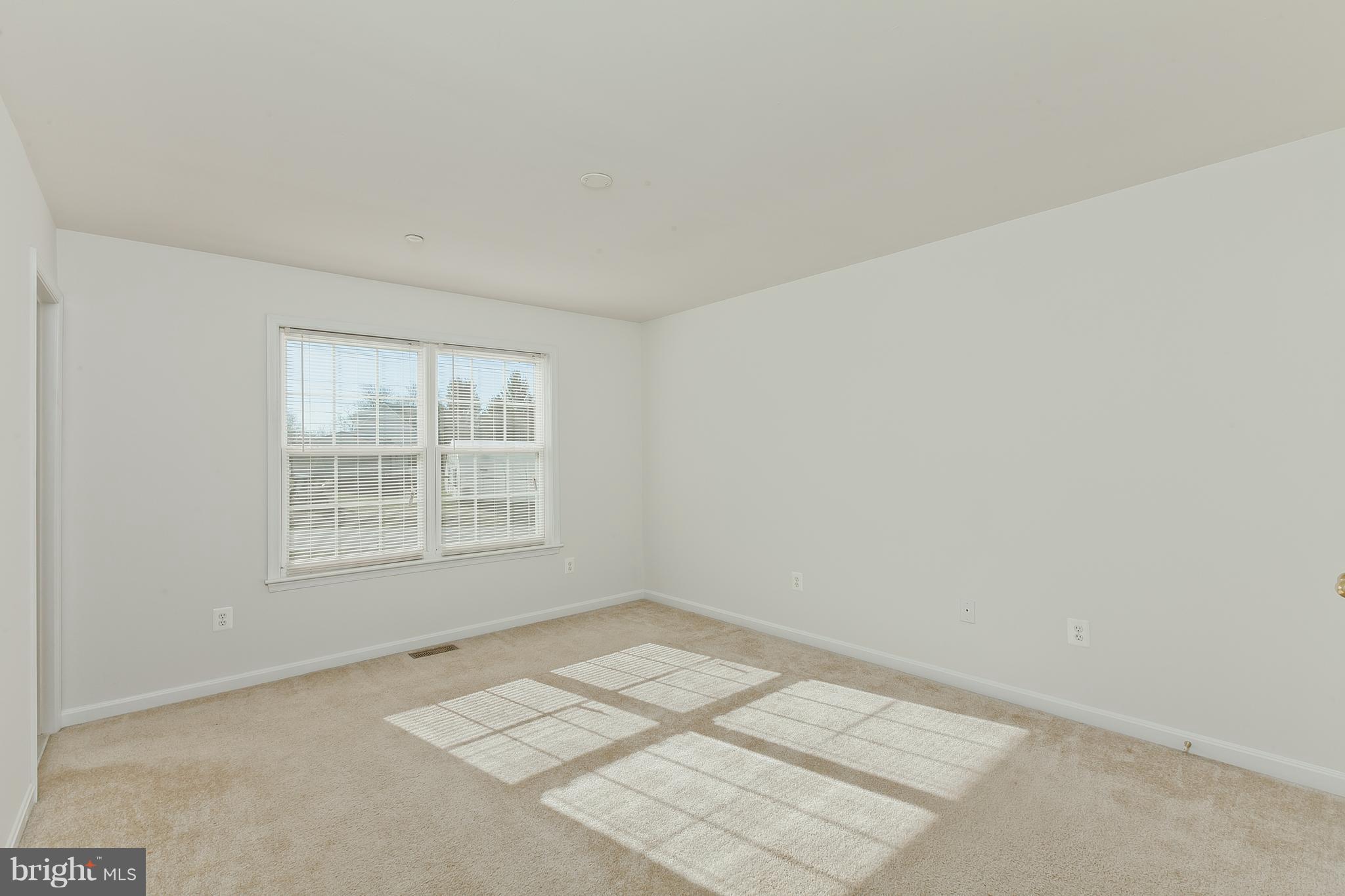 14613 Toll Road New Windsor, MD 21776 - Photo 13 of 30 an empty room with a window