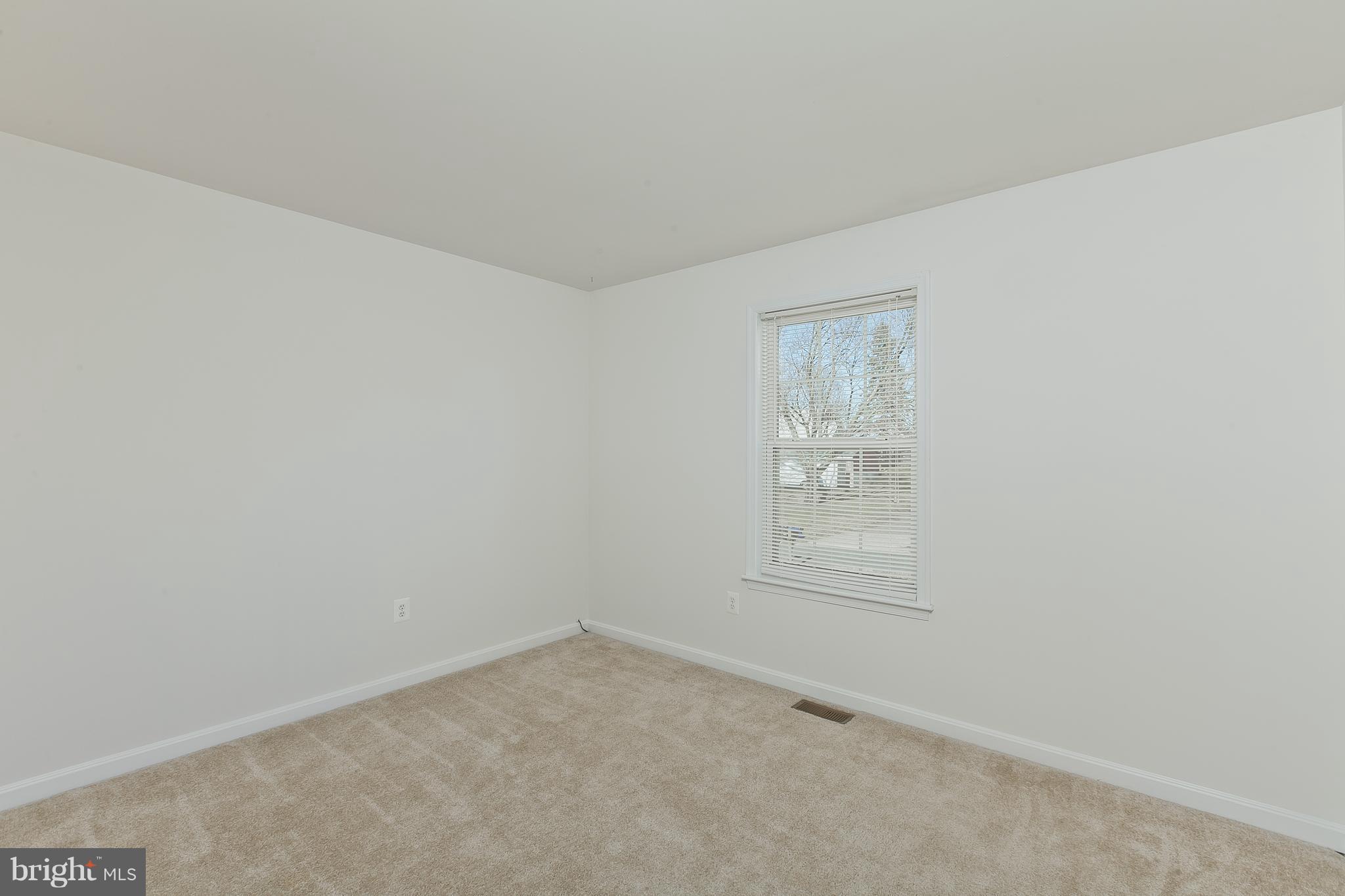 14613 Toll Road New Windsor, MD 21776 - Photo 15 of 30 an empty room with a window