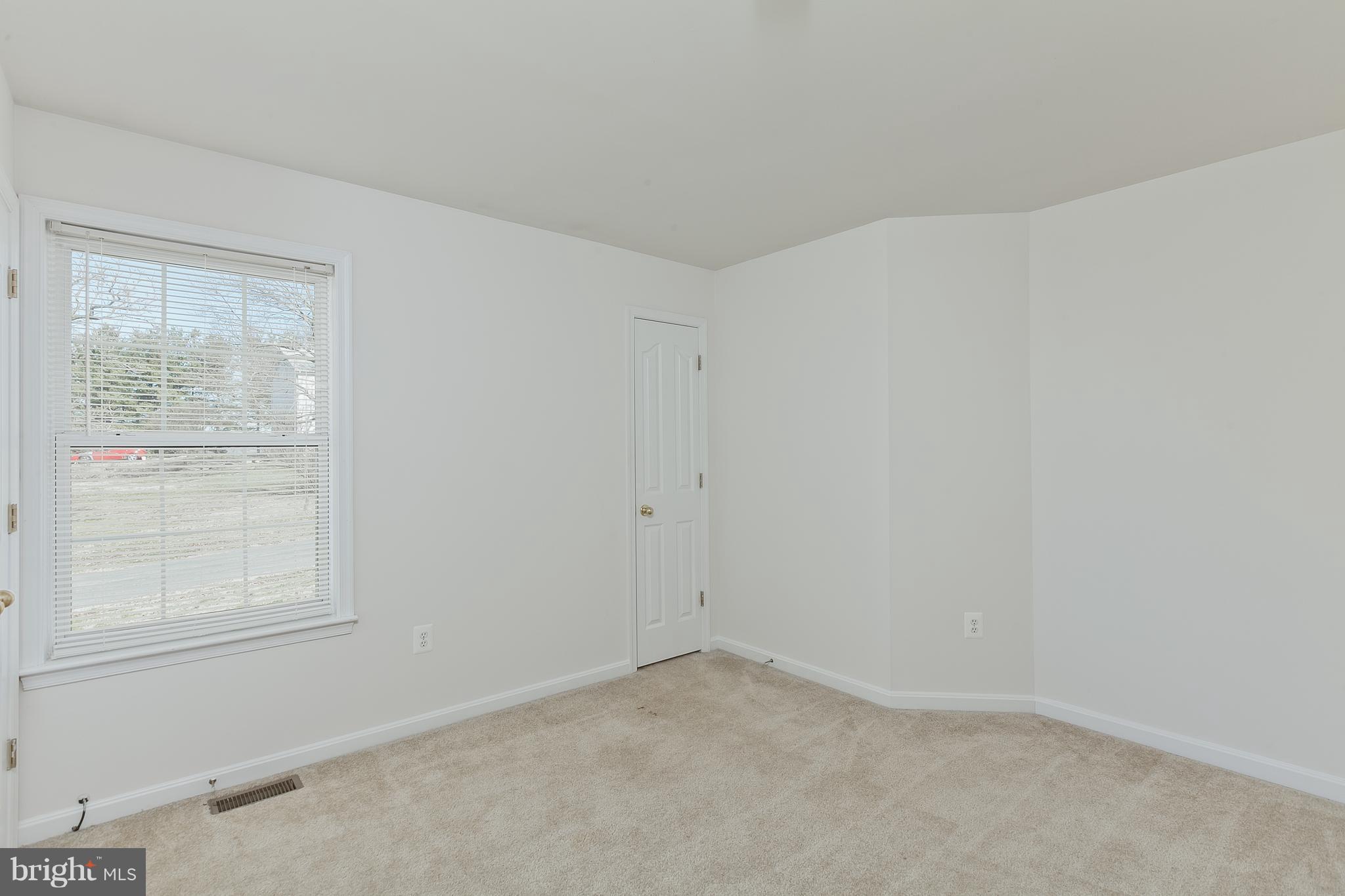 14613 Toll Road New Windsor, MD 21776 - Photo 16 of 30 an empty room with a window