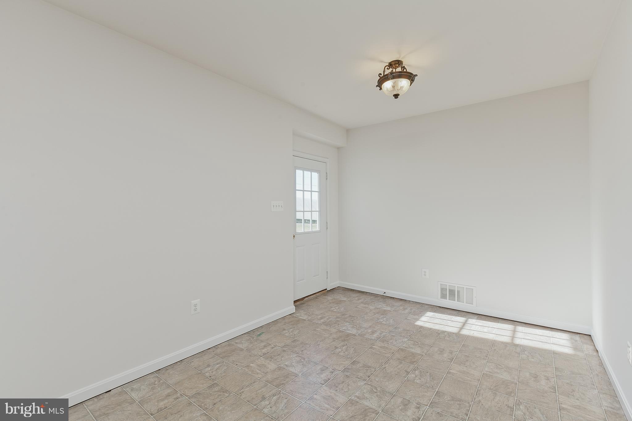 14613 Toll Road New Windsor, MD 21776 - Photo 22 of 30 a view of a room with closet and windows