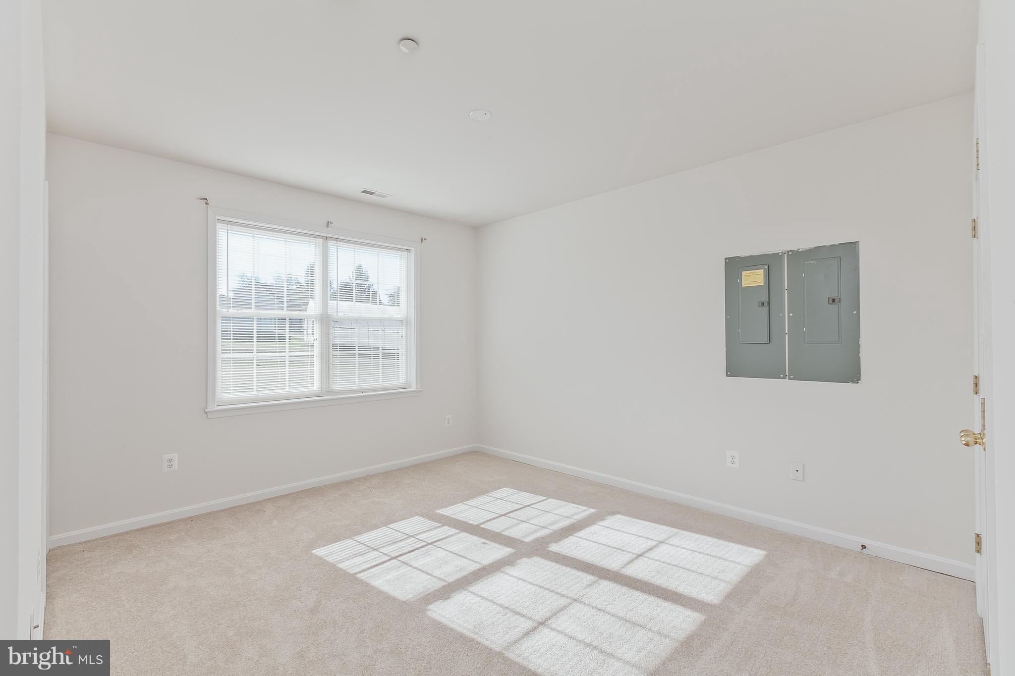14613 Toll Road New Windsor, MD 21776 - Photo 24 of 30 a view of an empty room with a window