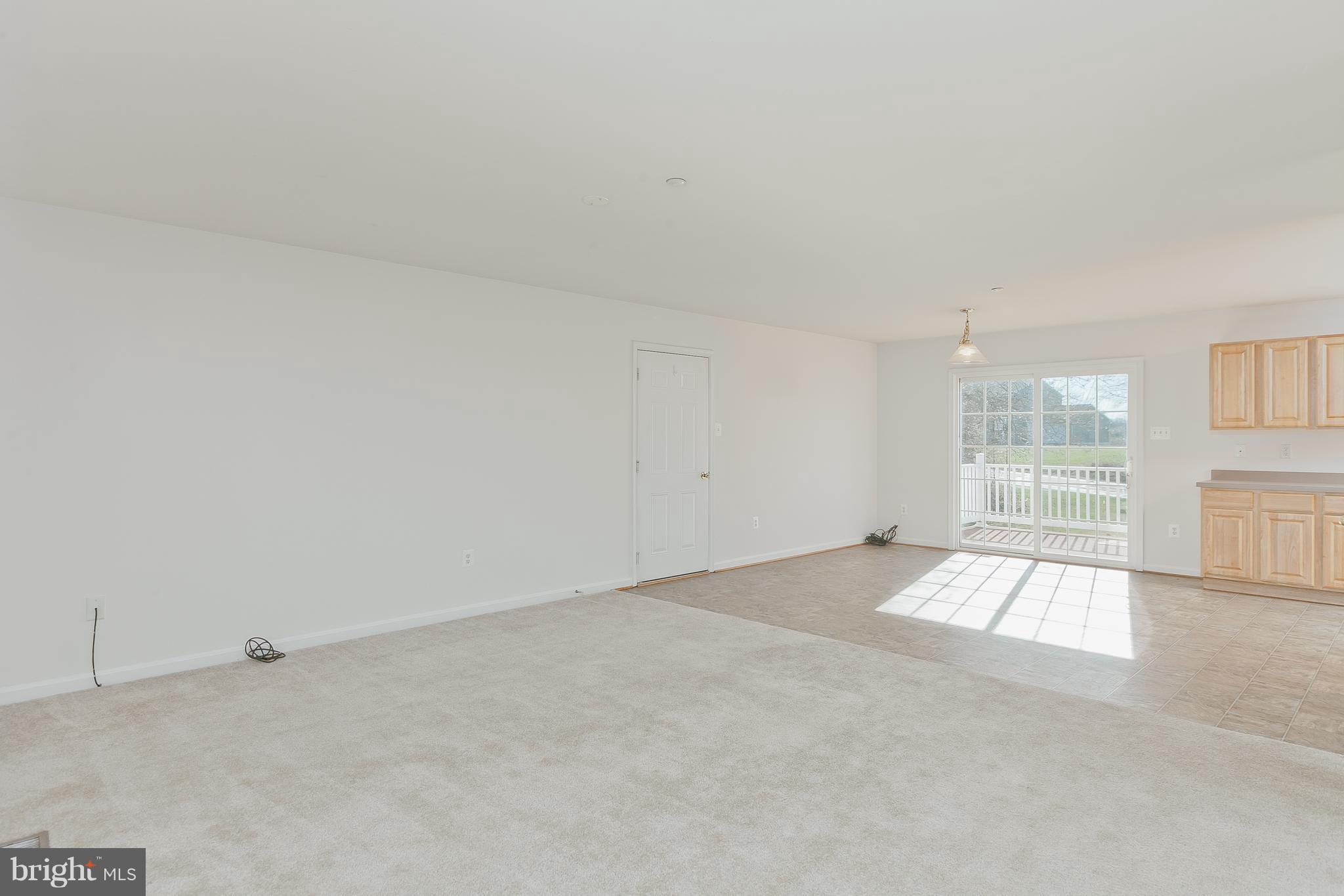 14613 Toll Road New Windsor, MD 21776 - Photo 5 of 30 a view of an empty room with a window