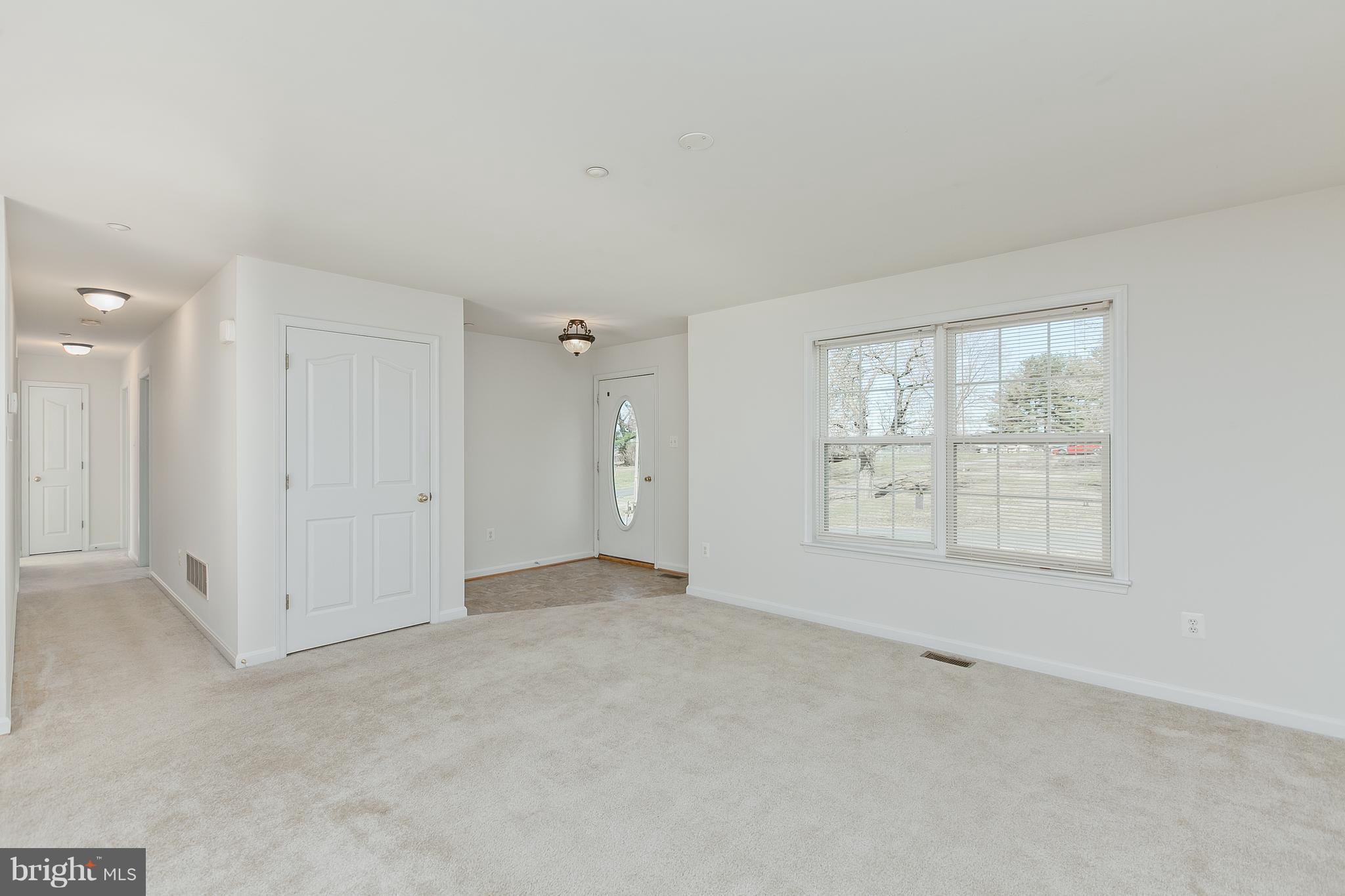 14613 Toll Road New Windsor, MD 21776 - Photo 6 of 30 an empty room with windows