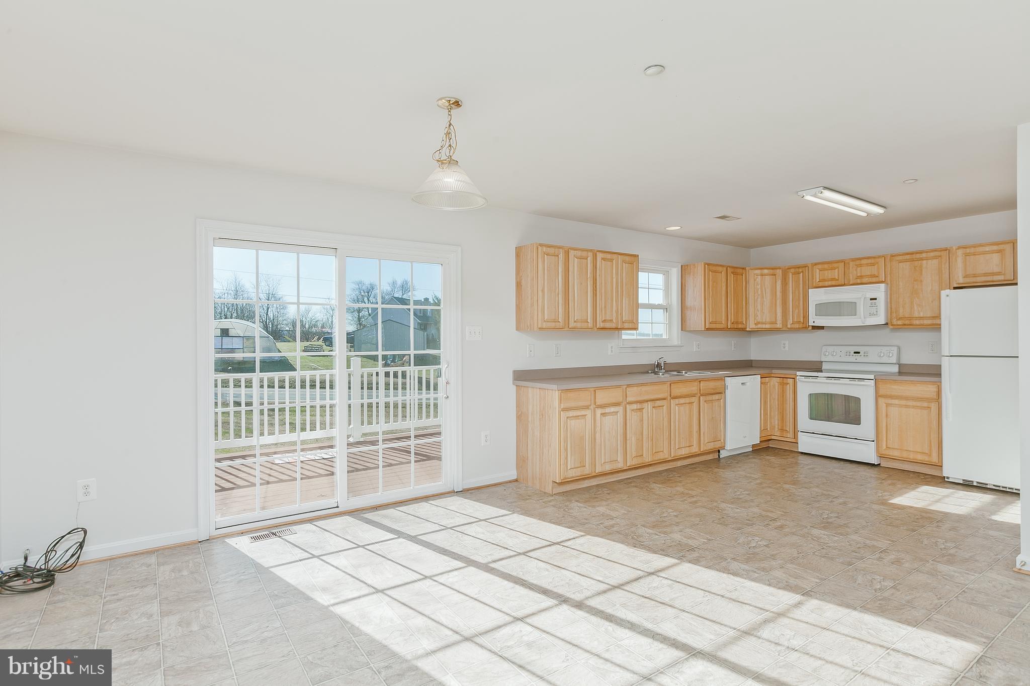 14613 Toll Road New Windsor, MD 21776 - Photo 8 of 30 a view of a kitchen with a sink