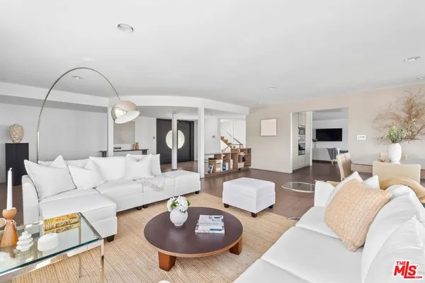 a bathroom with a double vanity sink and a bathtub