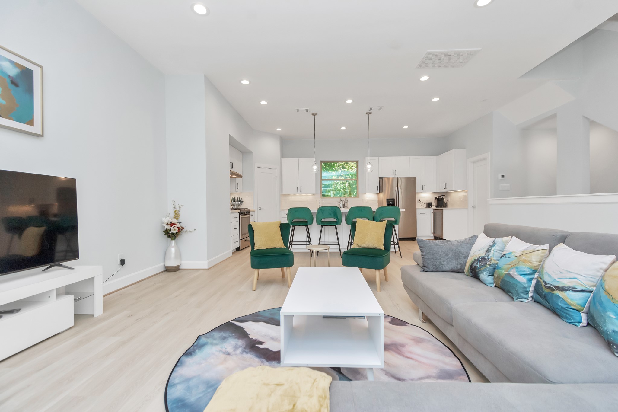 3310 Pease Street, Unit B Houston, TX 77003 - Photo 23 of 50 a living room with furniture and a flat screen tv