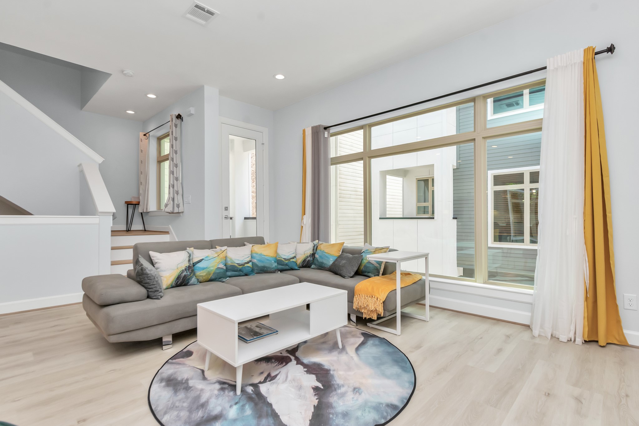 3310 Pease Street, Unit B Houston, TX 77003 - Photo 25 of 50 a living room with furniture and a large window