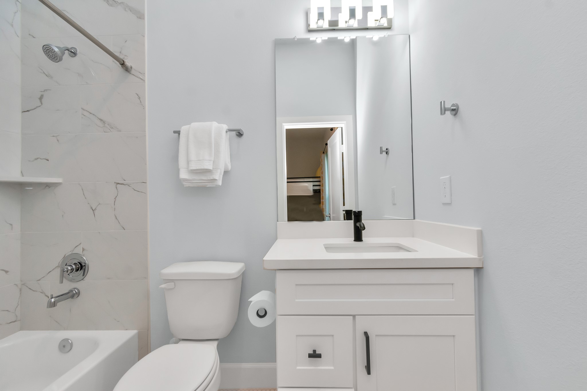 3310 Pease Street, Unit B Houston, TX 77003 - Photo 33 of 50 a bathroom with a sink a toilet and shower