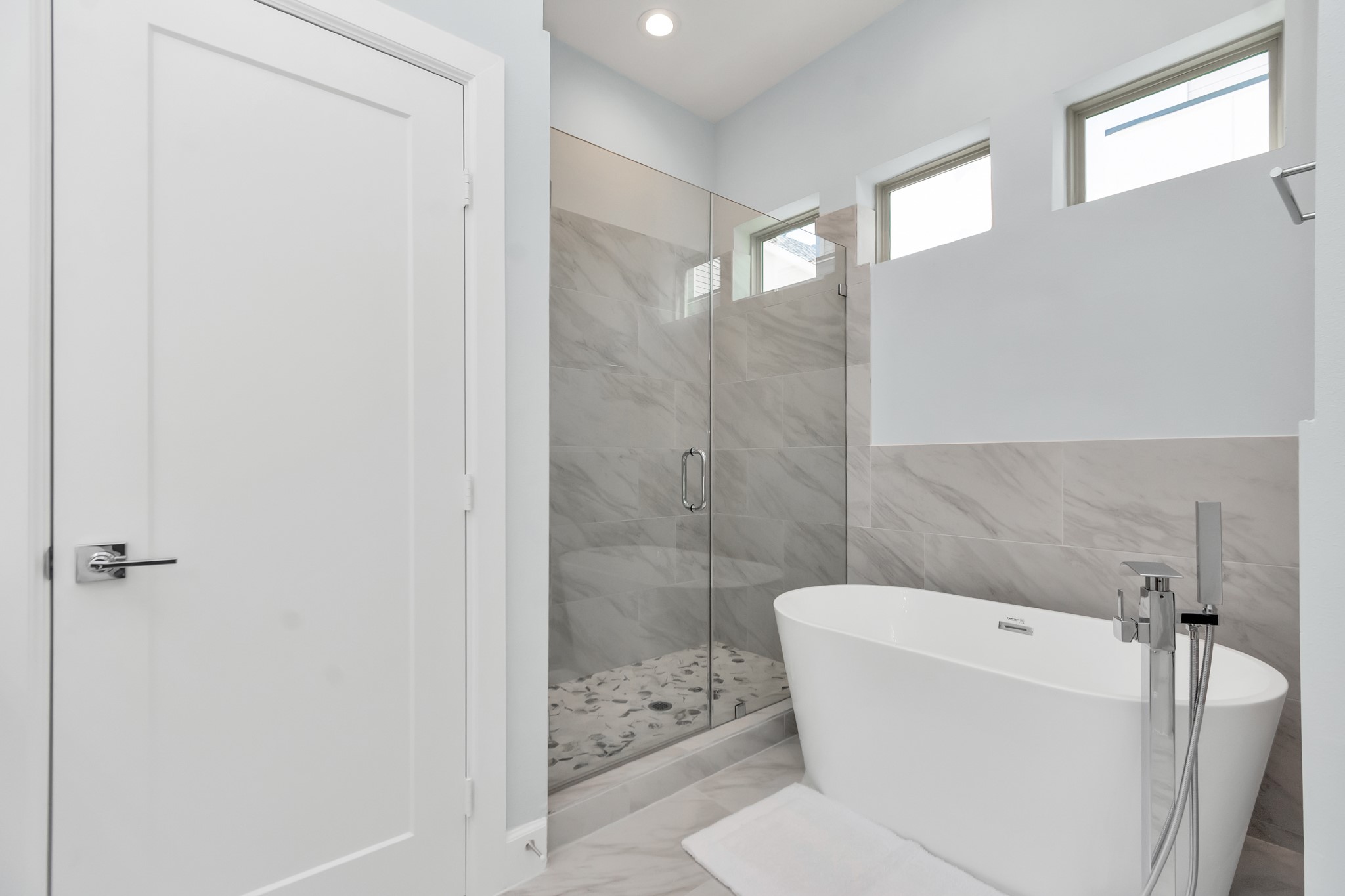 3310 Pease Street, Unit B Houston, TX 77003 - Photo 40 of 50 a bathroom with a bathtub and a shower