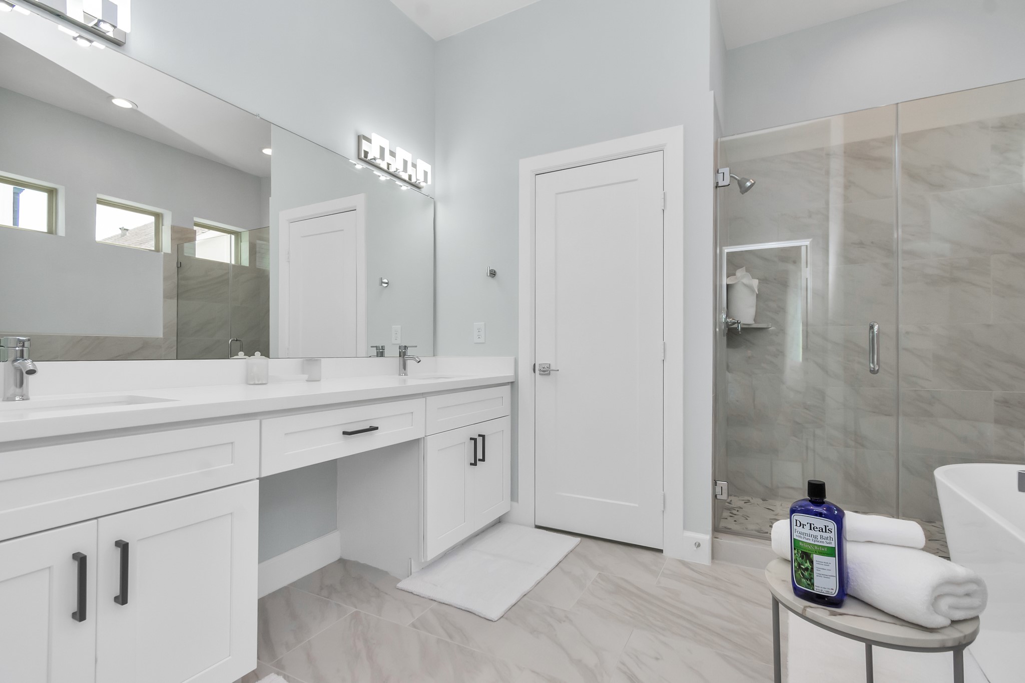 3310 Pease Street, Unit B Houston, TX 77003 - Photo 42 of 50 a spacious bathroom with a double vanity sink mirror and shower