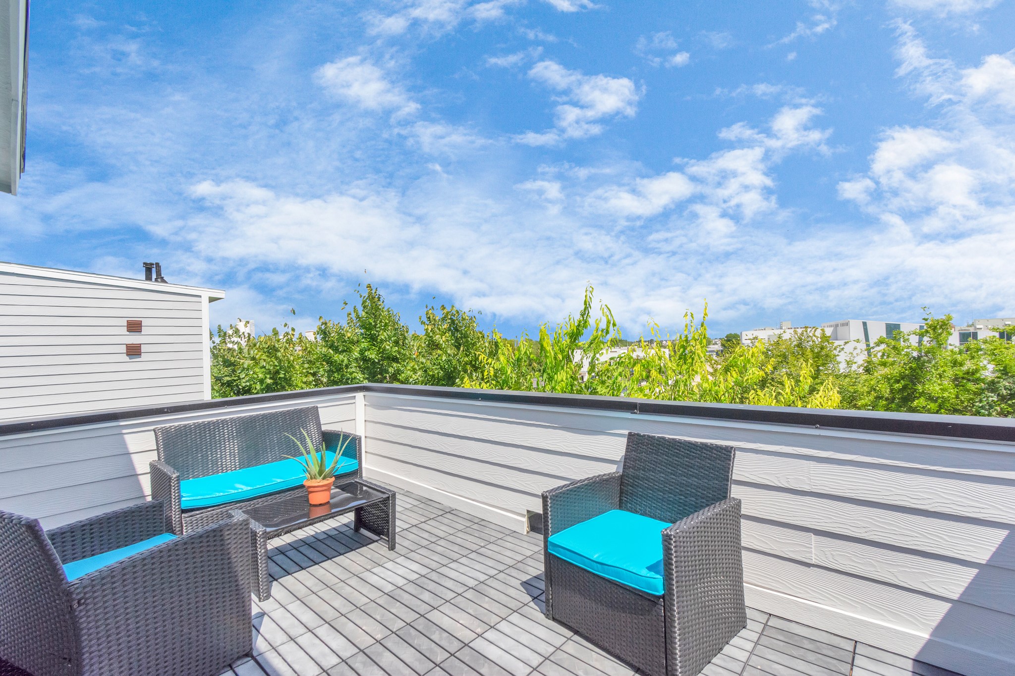3310 Pease Street, Unit B Houston, TX 77003 - Photo 43 of 50 a view of a chairs and a table in the patio