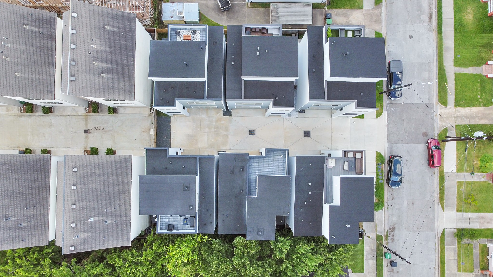 3310 Pease Street, Unit B Houston, TX 77003 - Photo 5 of 50 an aerial view of residential houses with outdoor space and parking